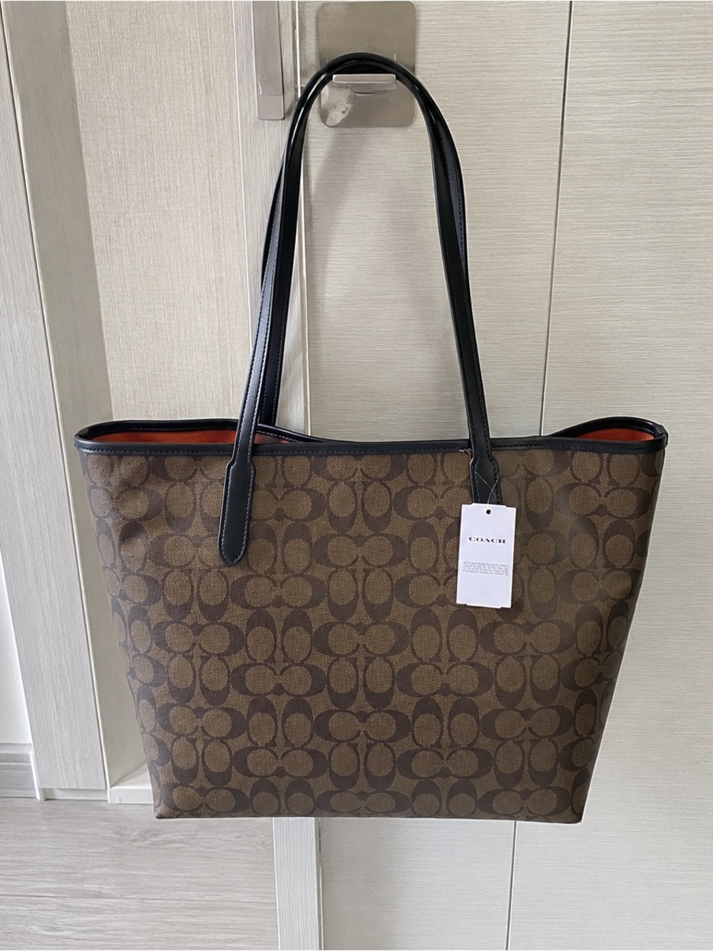 Coach Brown Signature Canvas Tote with Black Handles and Halloween Motif